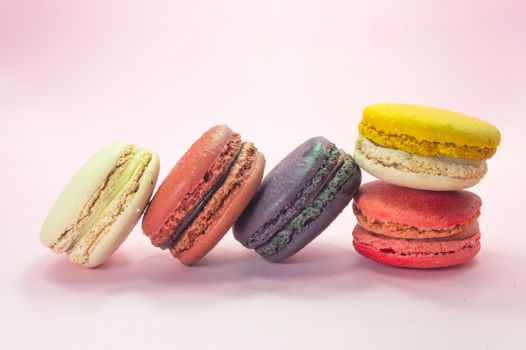 colorful macaron on the pink background