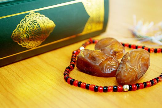 Date palm with quran for greeting ramadan kareem