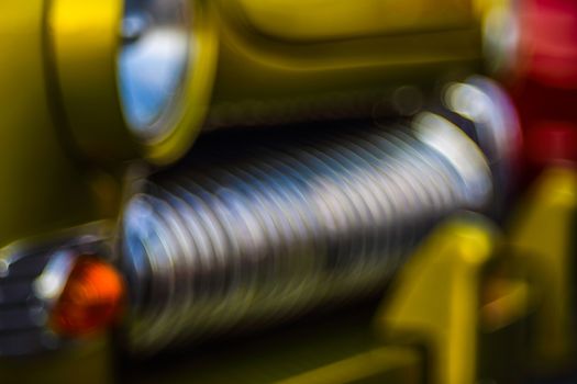 Colorful abstract background retro car. Metal close-up texture background. Soft focus, boke background with copy space. Close up image of a metal car grill.