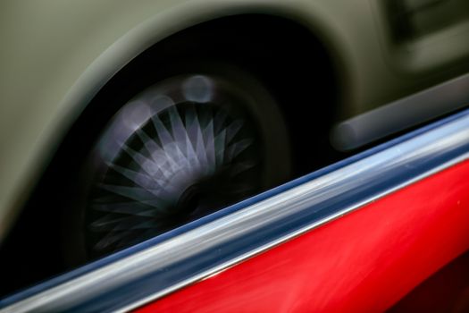 Classic car abstraction background. Soft focus, boke background with copy space. Vintage car details close up view. Abstract blur background.
