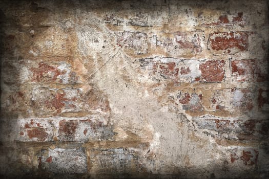 Aged and weathered old brick wall texture in a vintage retro design 