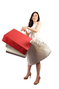a happy women with shopping bag on white background with clipping path