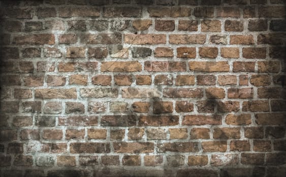 Aged and weathered old brick wall texture in a vintage retro design 