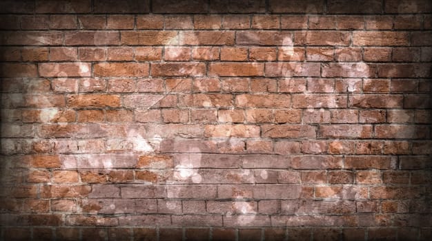 Aged and weathered old brick wall texture in a vintage retro design 