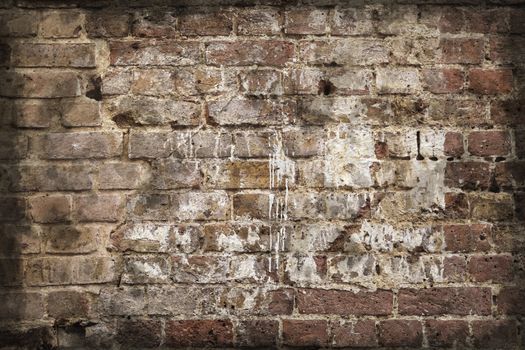 Aged and weathered old brick wall texture in a vintage retro design 