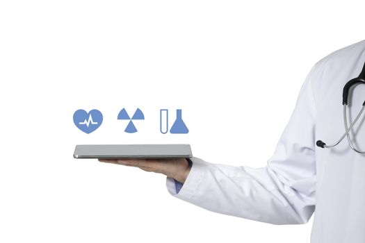 A doctor holding out a tablet with diagnostic medical icons relating to laboratory tests, xray examinationn and cardiology investigations. Medical checkup concept.