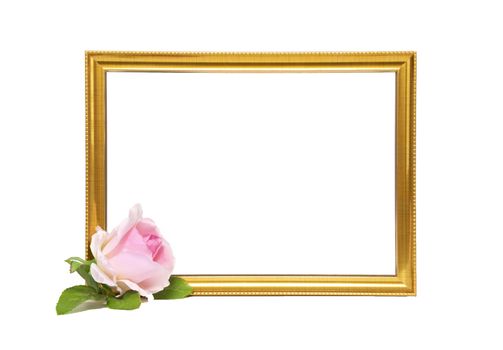 Vintage gold colored wooden frame and beautiful pink rose. Mock up template with copy space for text. White background.