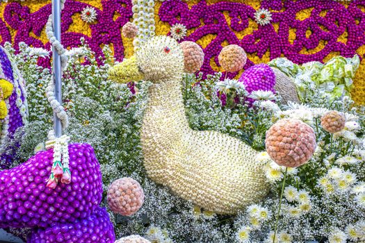 Little white duckling handcrafted from hundreds of tiny white flowers, a decoration on the flower float on Flower festical day parade, February 8th, 2020.