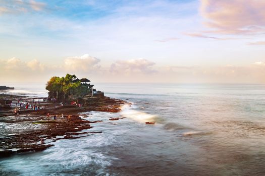 Tanah Lot & Batu Bolong temple. Long exposure effect, Bali Indonesia. Tropical nature landscape of Indonesia, Bali.