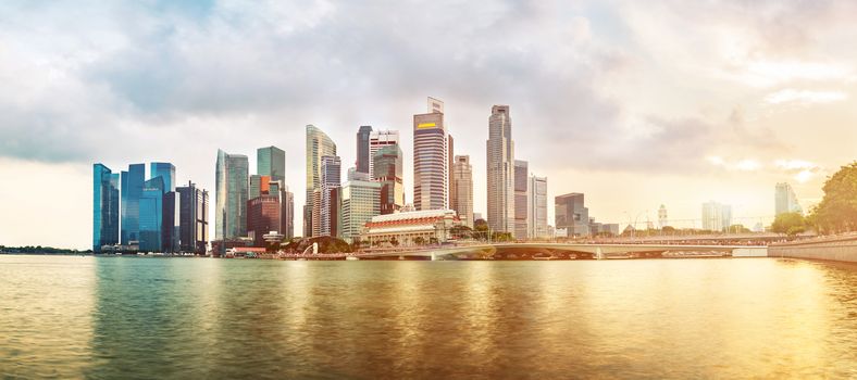 Singapore business district skyline during sunset. Group of skyscrapers at Marina Bay, Singapore.