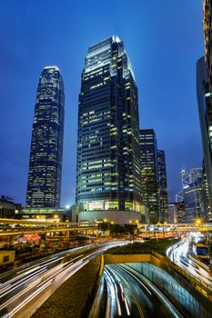 Hong Kong skyline at central business district with light trail on the evening, Hong Kong, China.