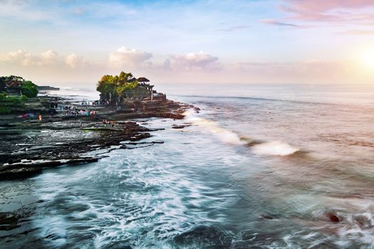 Tanah Lot & Batu Bolong temple. Long exposure effect, Bali Indonesia. Tropical nature landscape of Indonesia, Bali.