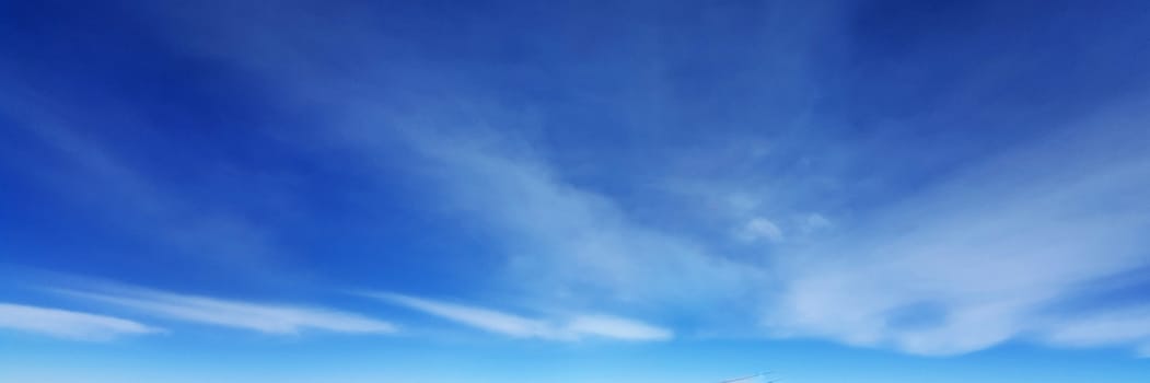 Panorama sky with cloud on a sunny day. Beautiful cirrus cloud.