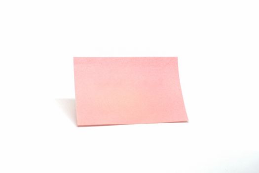 Isolated Single pink notepad paper on white background.