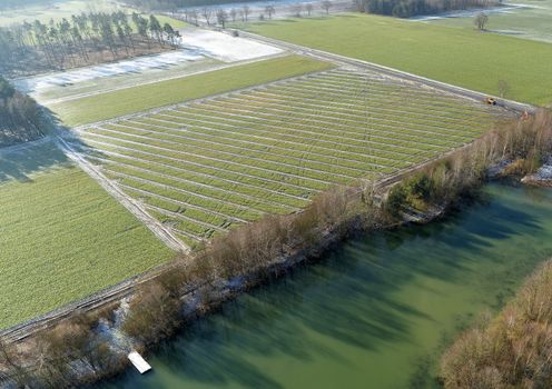 Aerial photographs, new drainage strands for draining arable land in spring, drone shot