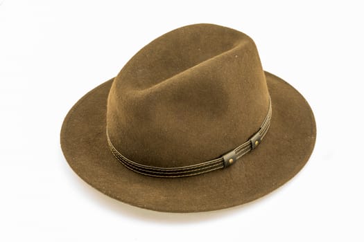 Brown felt hat, taken from the side, isolated against a white background, free space