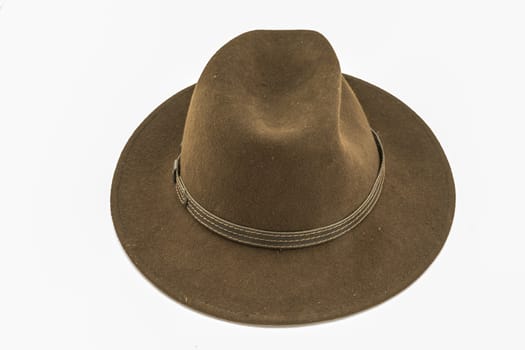 Brown felt hat, taken from the front, isolated against a white background, free space