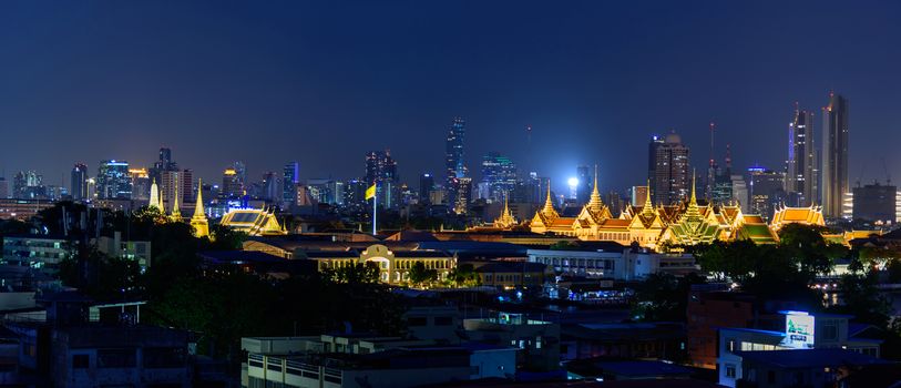 Bangkok , Thailand - 19 June, 2020: Panorama view of Wat Phra Keaw Public landmark in Thailand in night time and city in background