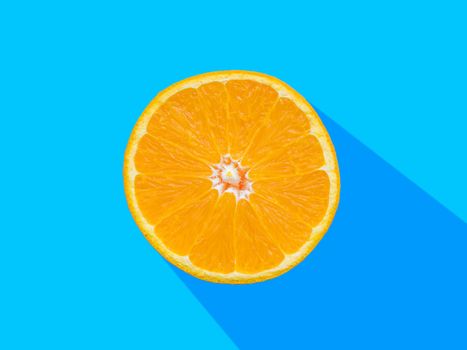 Fresh orange slices patterned over blue background, top view