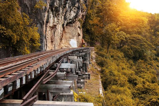 Train ride on the Death railway (river Kwai, Thailand). Death Railway train passing over the Tham Krasae Viaduct. Thai-Burma Railway