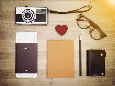 Travel accessories on wooden background , flat lay. Travel background.