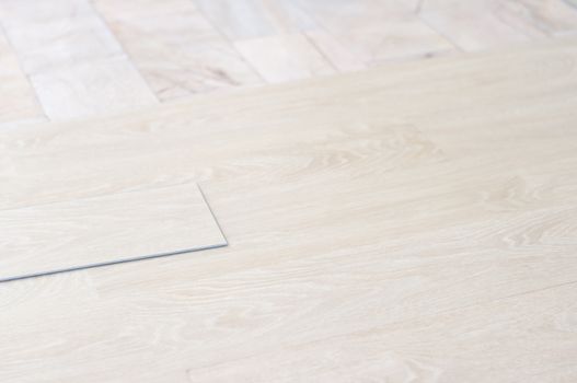 Home. Home renovate and wood materials.  Materials design for home furniture. Copyspace for text background. sample of wood plank surface. Plywood, Laminate, veneer. vinyl wood floor Installation for home decoration with laminate vinyl wood floor. 