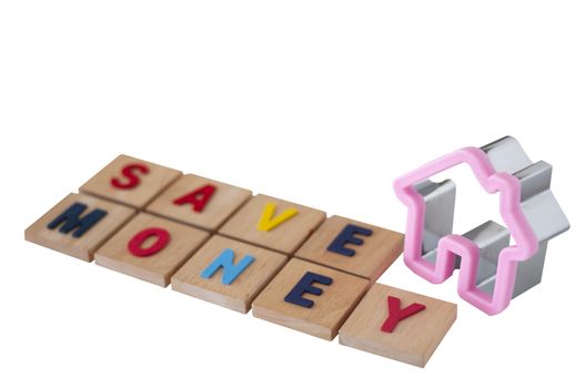 Financial concept. Alphabet on wood plate. home save money. Investment in Real estate.