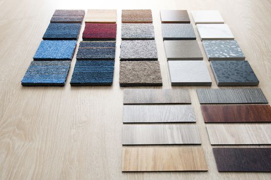 Sample of materials construction on wood background. Materials use for Interio designer. Home construction decorate room with luxury constructions set. Sample of Concretes and Wood laminate tiles.