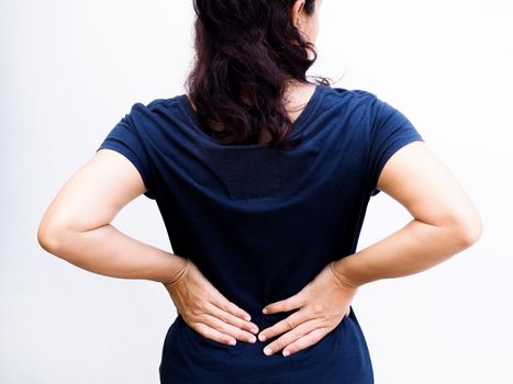Young thai asian woman suffering low back pain and waist lumbar pain