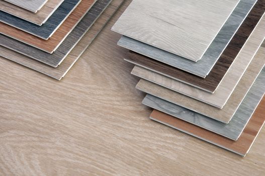 sample of wood material color. wood surface texture.  multi color vinyl floor tile. veneer, laminate, polywood.