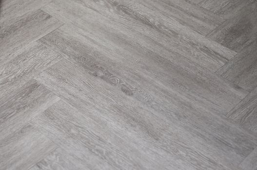 pattern of wood laminate  veneer  vinyl texture tile.
Wood pattern installing floor tile. 
