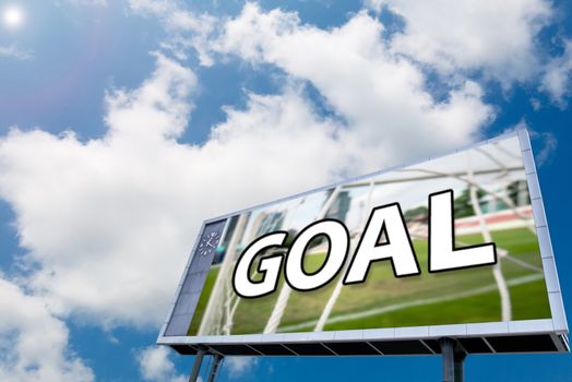 text GOAL on led scoreboard , blue sky background. sport concept