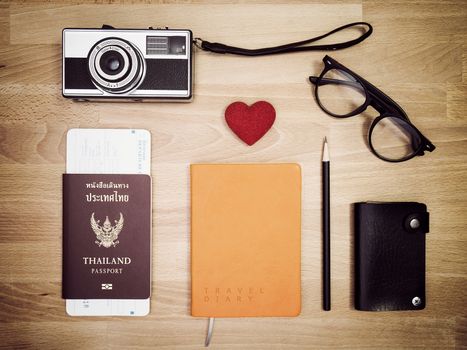 Travel accessories on wooden background , flat lay. Travel background.