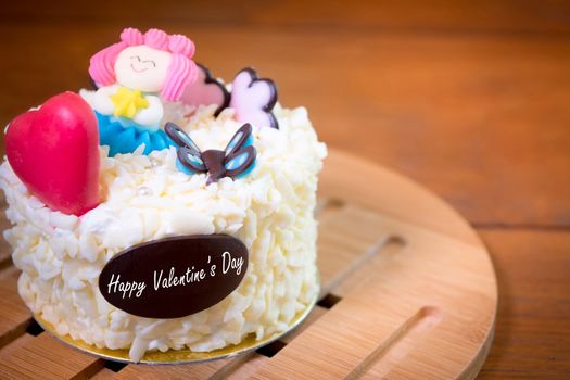 Love concept : Valentines cake with heart and cute decorate . Valentines background