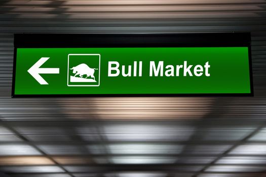 Financial concept. indicated stock market activity. A modified sign indicating a bull market ahead. Green color