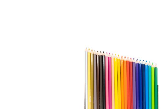 24 colored pencils arranged diagonally with gradients in the bottom right corner of the image on a white background.