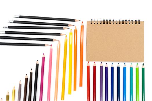 A total of 6 pencils are placed horizontally and 24 colored pencils vertically, with a gradient and a brown notebook in the top right corner of the image on a white background.