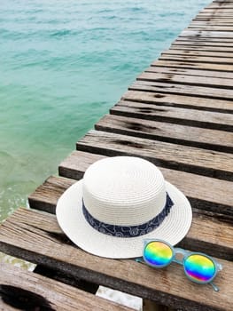 vacation on summer time at the beach concept. beach accessories on wooden bridge. summer background.