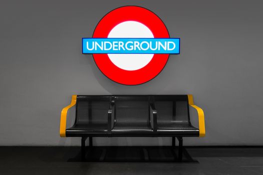 underground sign with bench color filter effect. mockup of underground led light box sign for background