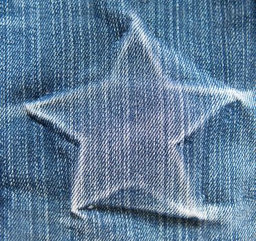 star on denim texture. light blue natural clean denim texture for the traditional business background in cold bright colors with diagonal shift tilt lines and stitches