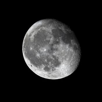 Moon lunar sphere isolated on a black background useful for screen blending or graphic brush
