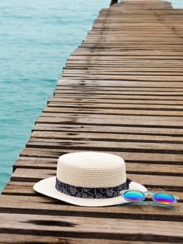 vacation on summer time at the beach concept. beach accessories on wooden bridge. summer background.