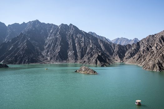 Hatta is the inland exclave of the emirate of Dubai in the UAE where people can enjoy kayaking and boating on the lake of Hatta Dam. United Arab Emirates