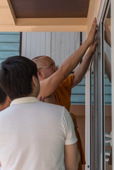 Ang Thong, Thailand - May 21, 2017 : Thai monk ritual for cerebrate the new house or house-warming ceremony in buddhist in Thailand