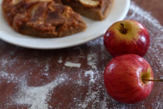 Fresh apples for baking home made apple cake shot in vintage dark and moody theme