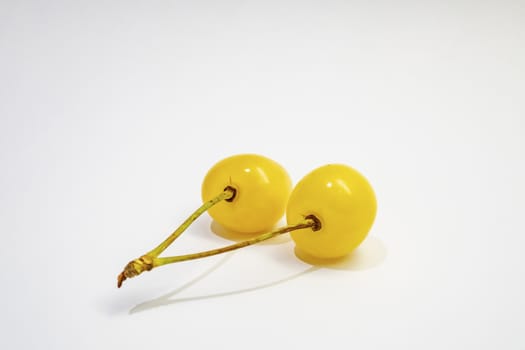 yellow cherry on a white background