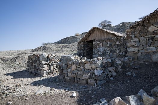 Houses in stones at Hatta Heritage Village, preserved, reconstructed and opened in 2001 by the government to showcase rural living dating back centuries. Dubai Emirates, United Arab Emirates