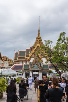 Bangkok, Thailand - August 25, 2017 : Unidentified Thai mourners wearing black color waiting in The Grand Palace to pay tribute and respect to their beloved Rama 9 Thai King Bhumibol Adulyadej