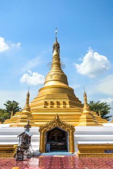 Payathonzu, Myanmar - March 2, 2018 : Golden Pagoda at Tai Ta Ya Monastery or Wat Sao Roi Ton Temple (Wooden Temple), Buddhist temple at Payathonsu in the south of Kayin State, Myanmar
