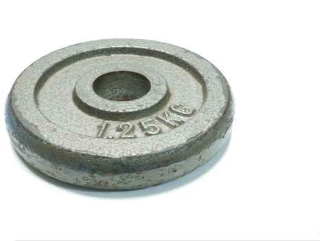 a cast iron weight plate, isolated on white background